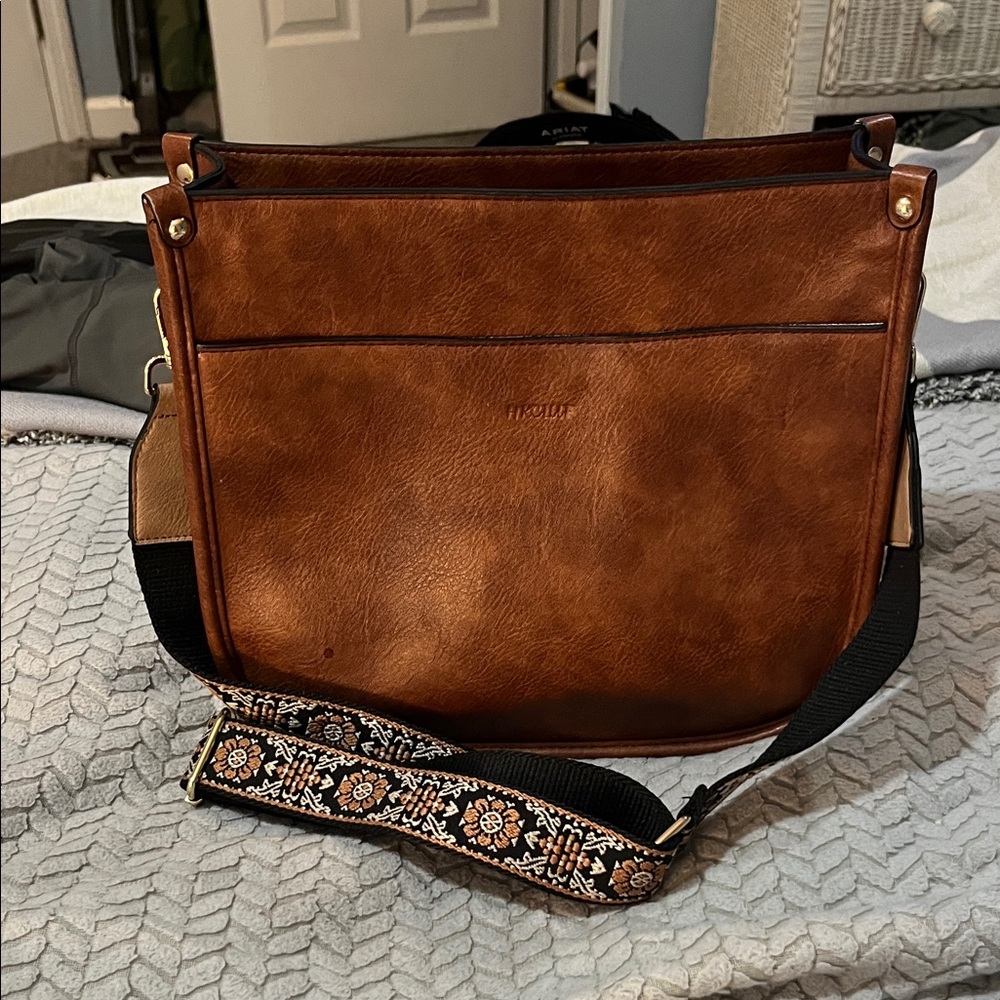 Elegant Brown Leather Bag with Floral Strap